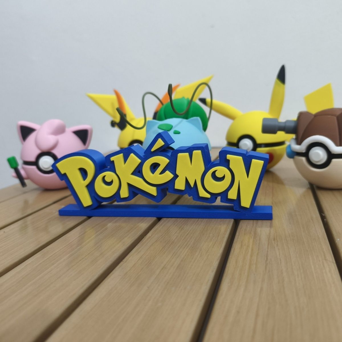 Anime Merchandise Logo - Figura colecionável do Pokémon com logotipo,